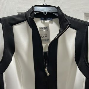 Tommy Hilfiger zip up dress with gold buckle belt. Never worn.
